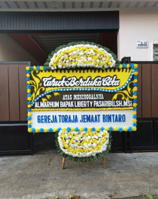 Papan Bunga Duka di Waiheru